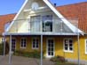 Galvaniseret altan monteret i Dronninglund, Nordjylland. Altan er med glasgelænder af sikkerhedsglas